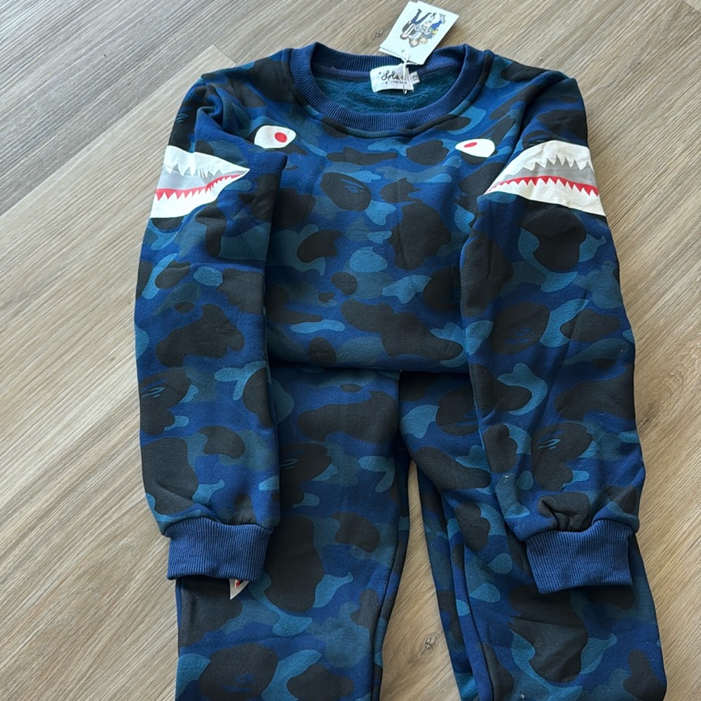 Brand new Shark Boy Camo Jigger set Color: Camo Blue 12 yo